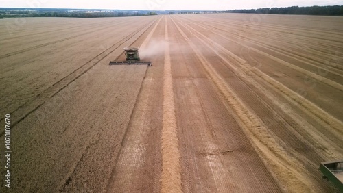 John Deere X9 1100 on August 8, 2023 in Ukraine. Illustrative Editorial content. Combine harvesting wheat photo