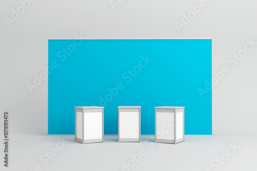 Three display counters in front of a blue backdrop for exhibitions. photo