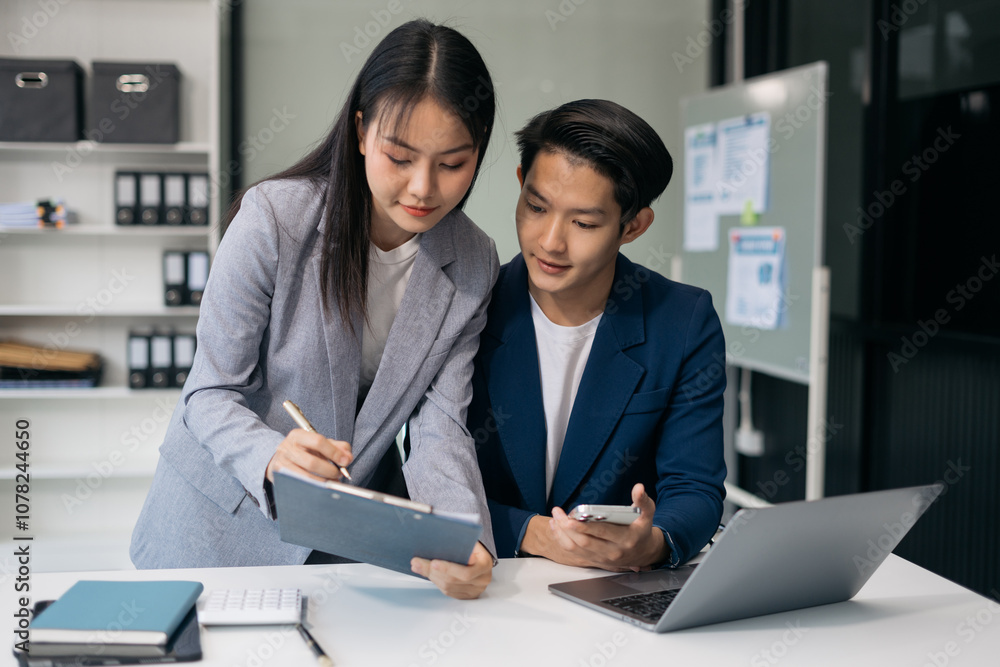 Project manager working and update tasks with milestones progress planning and professional investor working new start up project in the office. Project manager working and update tasks with milestones progress planning and professional investor working new start up project in the office.