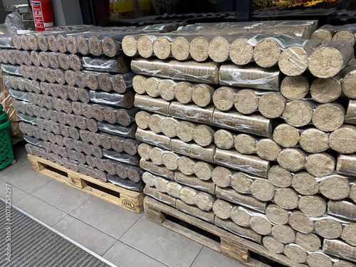 Wood briquettes for heating, packed in plastic film