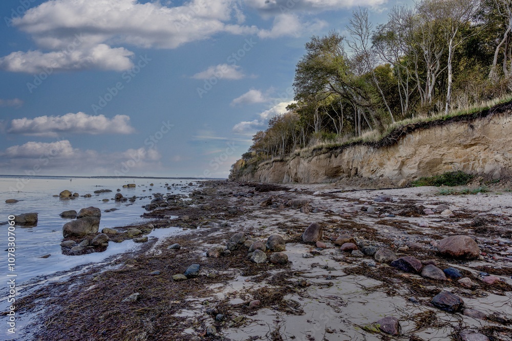 Steep coast of the island of Poel, marked by the tides of the Baltic Sea