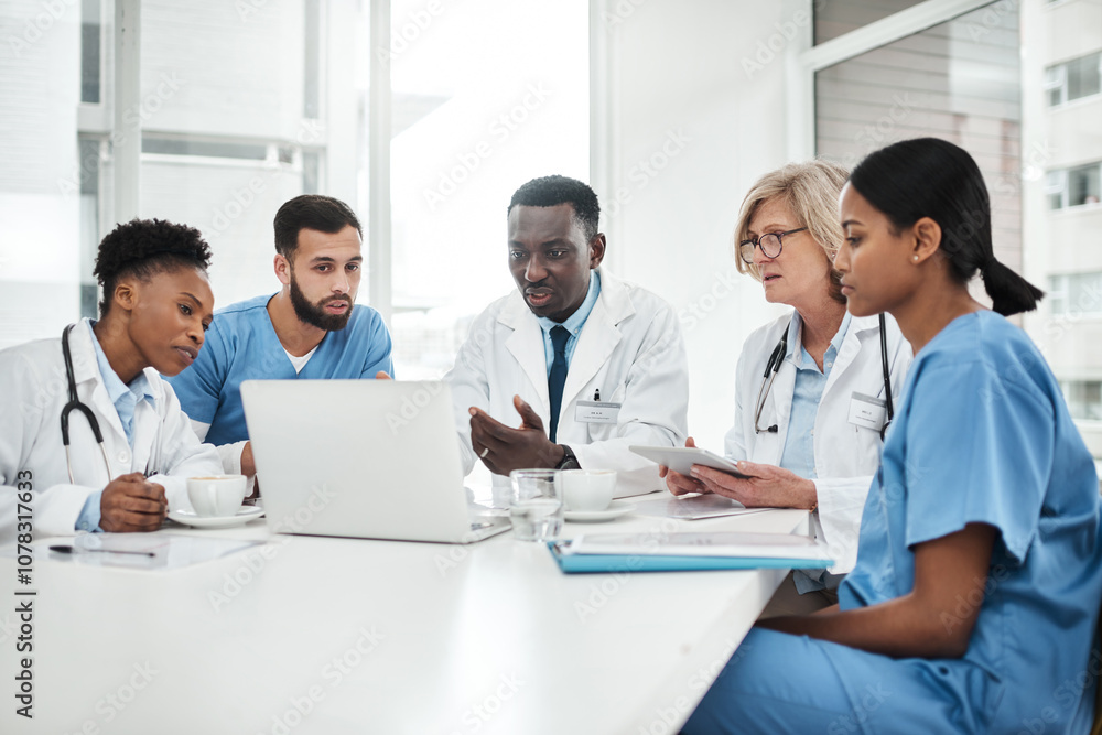 Doctor, team and laptop for meeting in office with healthcare diagnosis, surgery planning and medical workshop. Medicine, professional or nurse with technology for health assessment or treatment plan Doctor, team and laptop for meeting in office with healthcare diagnosis, surgery planning and medical workshop. Medicine, professional or nurse with technology for health assessment or treatment plan