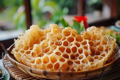 Beef honeycomb tripe salad in a bamboo tray known as kerabu perut in Kelantan Malaysia perfect for lunch or dinner photo