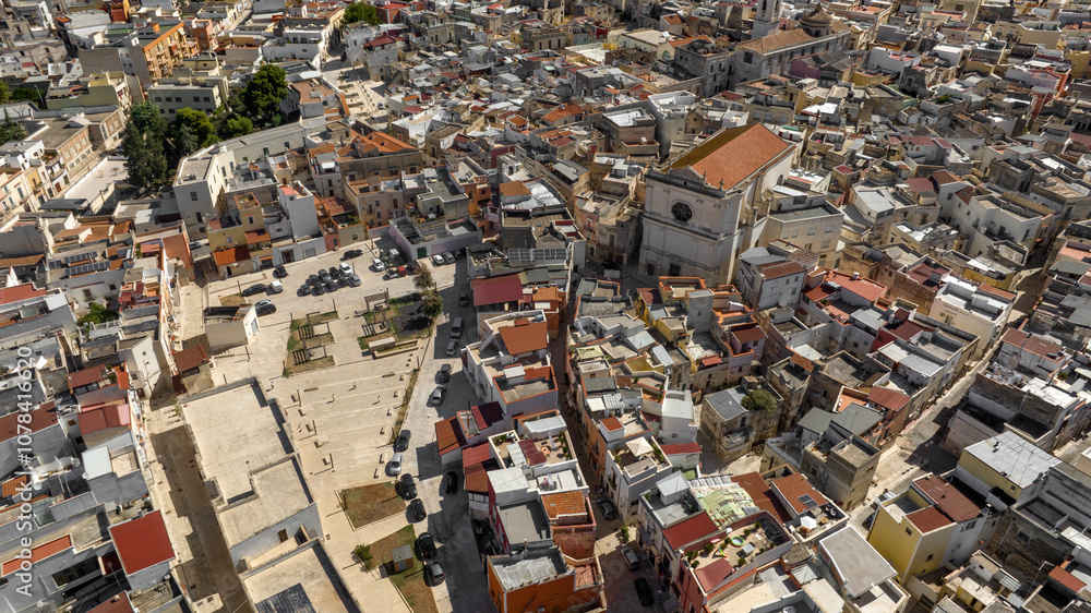 Aerial view of Grotte San Andrea Square and the church of San Nicola Trimodiense located in the historic center of Andria, in Puglia, Italy. Aerial view of Grotte San Andrea Square and the church of San Nicola Trimodiense located in the historic center of Andria, in Puglia, Italy.