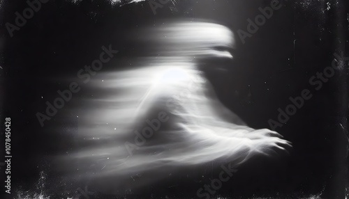 Dark and disturbing black and white portrait, blurry and ghostly of a person