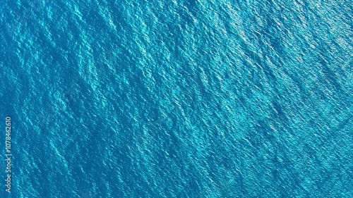 Wallpaper Mural Caribbean sea from drone. Gentle ripples on water surface with refraction of light. Abstract background of sea water flow under sunlight. Turquoise ocean surface. Sea wave close up. Torontodigital.ca