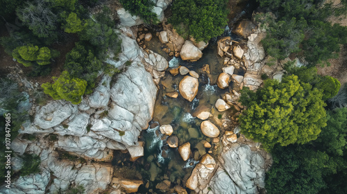 Drone view of an Acre, A large land unit.’s boundary with natural elements like rocks and streams.