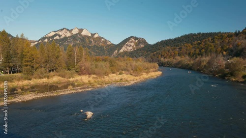 Polish mountains in autumn. Pieniny Mountains. View towards the rocky peaks of Trzy Korony. The Dunajec River in the Foreground. Sromowce Nizne, Poland