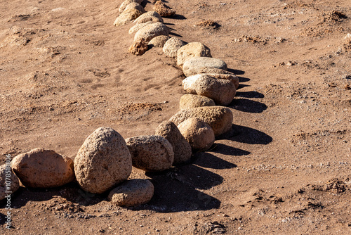 Stones and shadows on ground