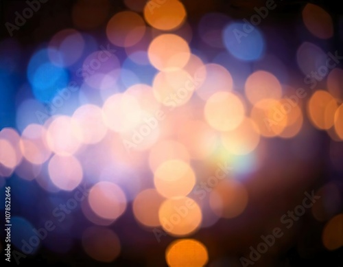 Glittering blue bokeh background with soft focus and sparkling lights