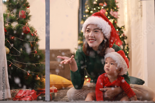 Asian mothers, they are happy together on Christmas and New Year's Day. Asian family and holidays concept.