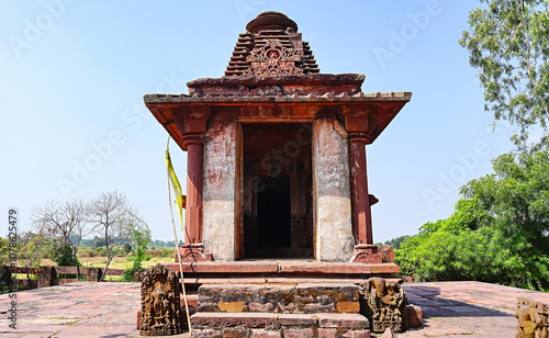 Carved 11th-century idol of Lord Vishnu at the Devguna Group of Temples, located in Maihar, Madhya Pradesh photo