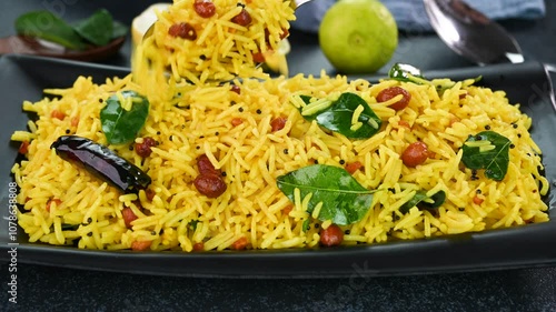 Serving lemon rice in a plate.