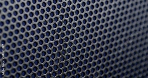 Wallpaper Mural Seamless loop. Perforated surface texture. Close-up view of a perforated surface with a repeating hole pattern. Torontodigital.ca