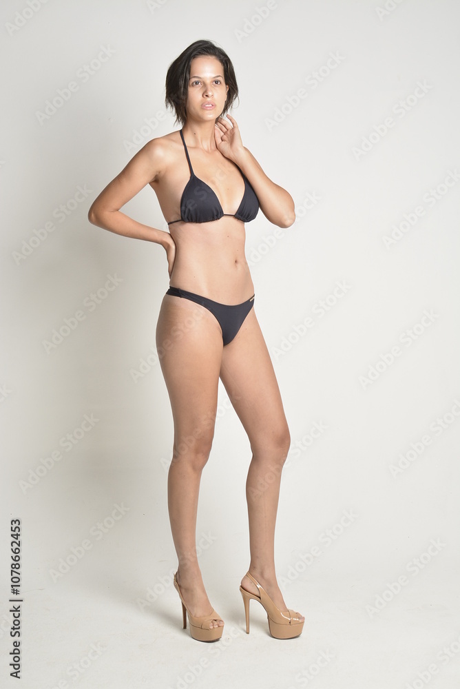 short hair, natural, no makeup, woman, white t-shirt, black pants, blue swimsuit, bikini, skates, casual, authentic, lifestyle, candid, minimal, female model, simplicity, everyday look, relaxed, comfo short hair, natural, no makeup, woman, white t-shirt, black pants, blue swimsuit, bikini, skates, casual, authentic, lifestyle, candid, minimal, female model, simplicity, everyday look, relaxed, comfo
