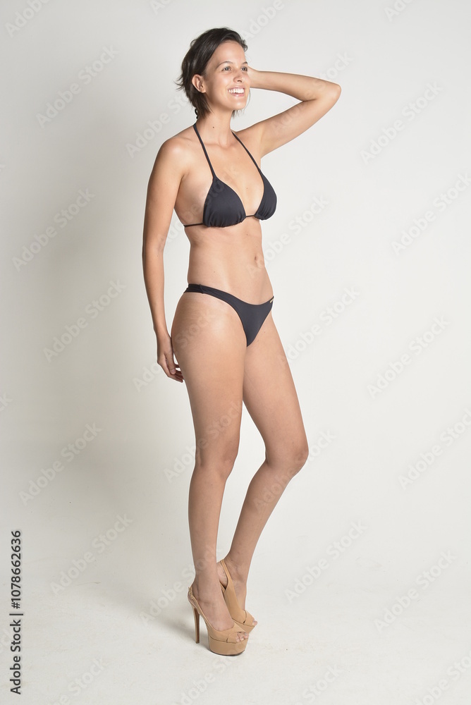 short hair, natural, no makeup, woman, white t-shirt, black pants, blue swimsuit, bikini, skates, casual, authentic, lifestyle, candid, minimal, female model, simplicity, everyday look, relaxed, comfo short hair, natural, no makeup, woman, white t-shirt, black pants, blue swimsuit, bikini, skates, casual, authentic, lifestyle, candid, minimal, female model, simplicity, everyday look, relaxed, comfo