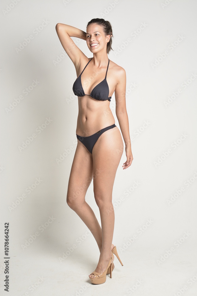 short hair, natural, no makeup, woman, white t-shirt, black pants, blue swimsuit, bikini, skates, casual, authentic, lifestyle, candid, minimal, female model, simplicity, everyday look, relaxed, comfo short hair, natural, no makeup, woman, white t-shirt, black pants, blue swimsuit, bikini, skates, casual, authentic, lifestyle, candid, minimal, female model, simplicity, everyday look, relaxed, comfo
