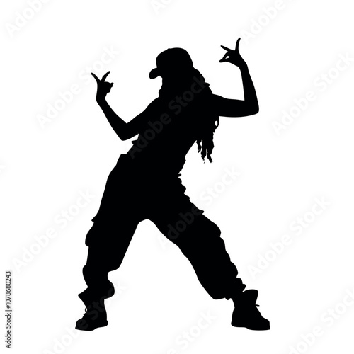 A woman is dancing in a black and white picture. She is wearing a hat and has her hands on her hips