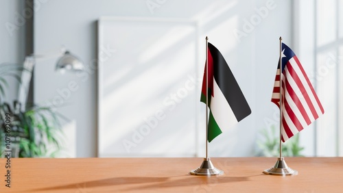 FLAGS OF JORDAN AND LIBERIA ON TABLE photo