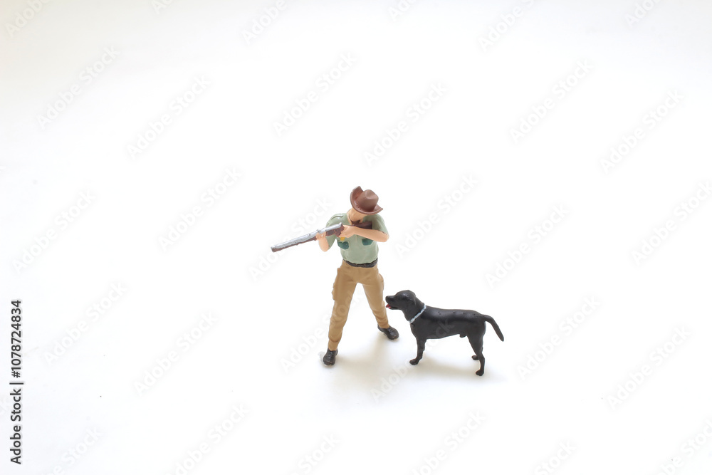 Miniature Figurine of Hunter with Rifle and Dog Miniature Figurine of Hunter with Rifle and Dog