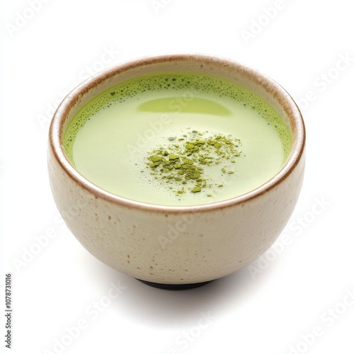 A vibrant bowl of matcha tea, showcasing rich green color and smooth texture, ideal for wellness and relaxation.