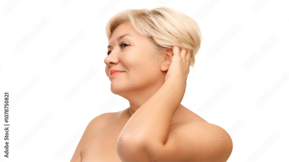 Aged woman with cheerful, light smile and clear complexion representing graceful approach to self-care against white studio background. Concept of natural beauty, spa treatment, cosmetology. Aged woman with cheerful, light smile and clear complexion representing graceful approach to self-care against white studio background. Concept of natural beauty, spa treatment, cosmetology.