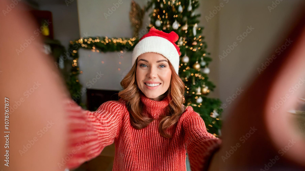 Self portrait of beautiful cute pretty sweet fooling girlfriend taking selfie in front of light of christmas tree wearing red cap
Self portrait of beautiful cute pretty sweet fooling girlfriend taking selfie in front of light of christmas tree wearing red cap