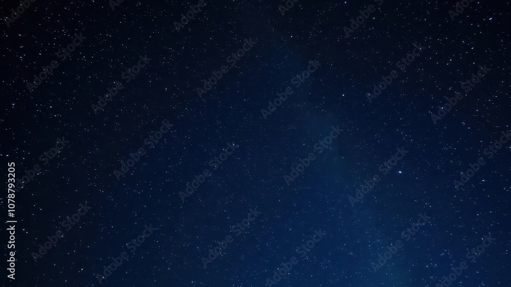 Twinkling stars scattered across a deep blue night sky, background, twinkling, sky Twinkling stars scattered across a deep blue night sky, background, twinkling, sky