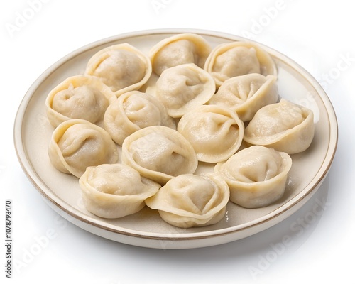 cooked dumplings beautifully laid out on a white tray isolated on a white background