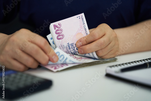 Turkish lira account. woman accountant.