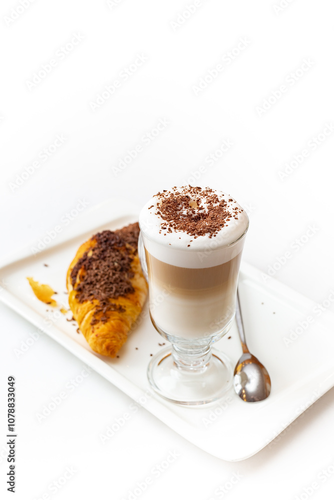 Сup of coffee with croissant on plate isolated on white background Сup of coffee with croissant on plate isolated on white background