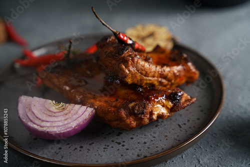 grilled juicy ribs with vegetables