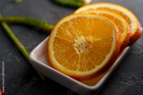 morning breakfast, juicy berries and fruits in a plate, orange, blueberry, raspberry, sea buckthorn and others