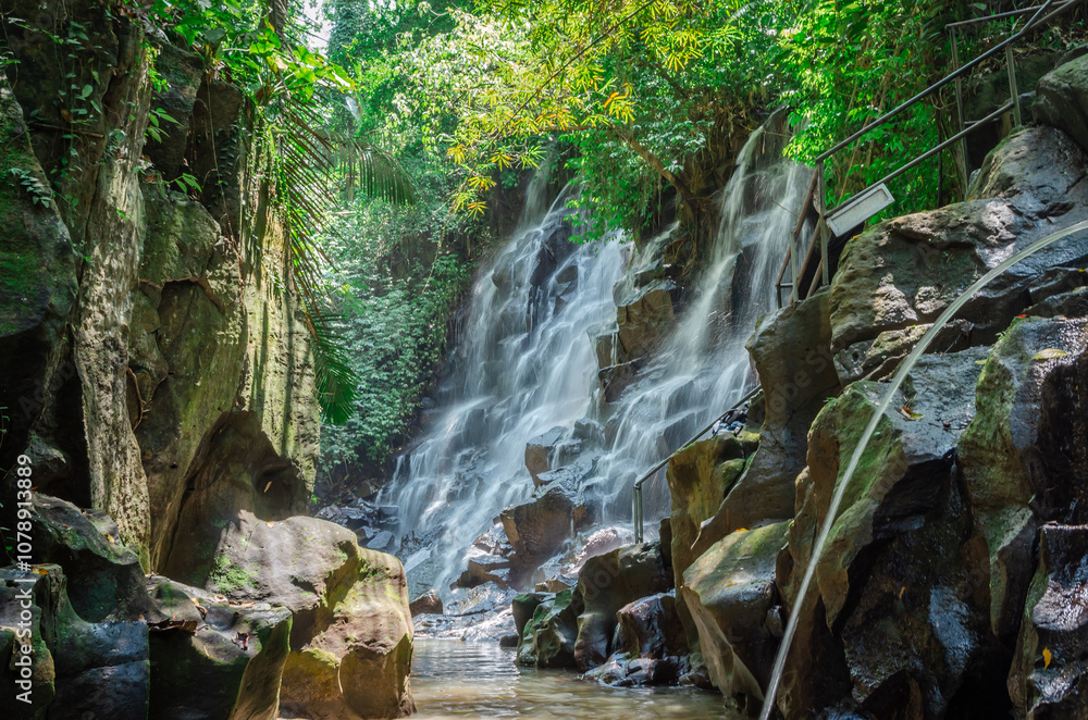 Beautiful Kanto Lampo waterfall in tropical rainforest in Bali, Indonesia