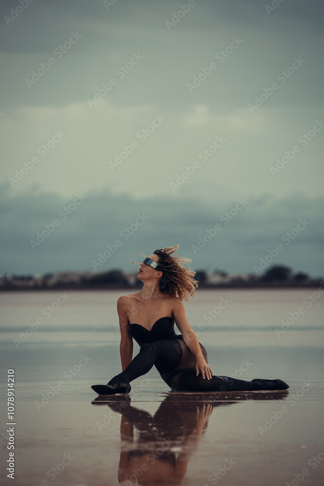 Young woman at the salt lake at the evening Young woman at the salt lake at the evening