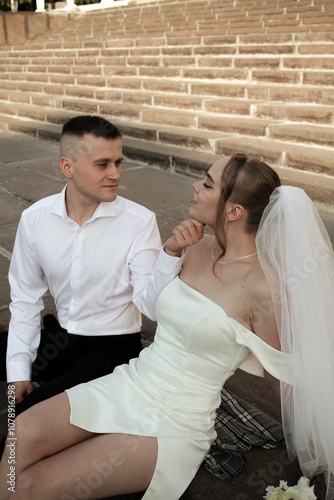 Newlyweds guy and girl. Wedding. White dress. Happiness.