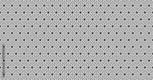 Seamless geometric pattern featuring circular shapes and triangular elements, perfect for backgrounds, wallpapers, and fabric designs.