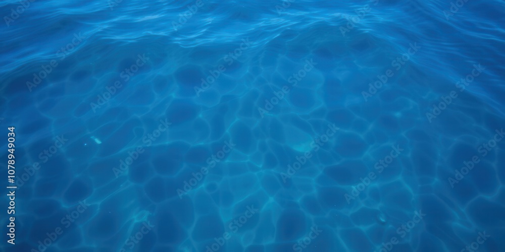 Obraz premium Swirling patterns of deep blue sea water with a shimmering texture, deep, ocean, summer