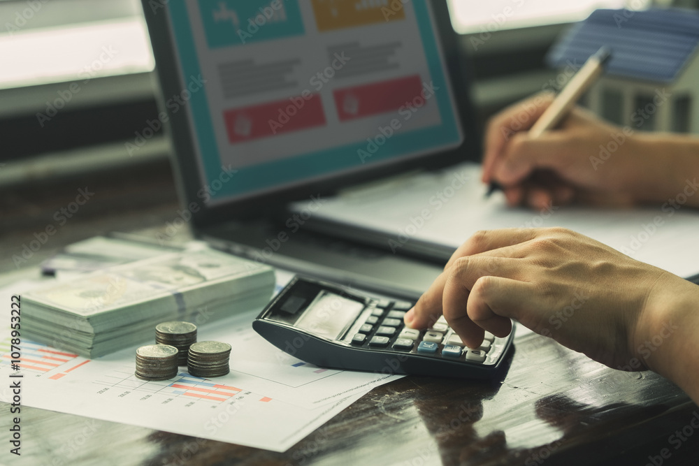 People are using computer to do online financial transactions such as debt, investment, calculation. Retro photo of economic downturn, stress. People are using computer to do online financial transactions such as debt, investment, calculation. Retro photo of economic downturn, stress.
