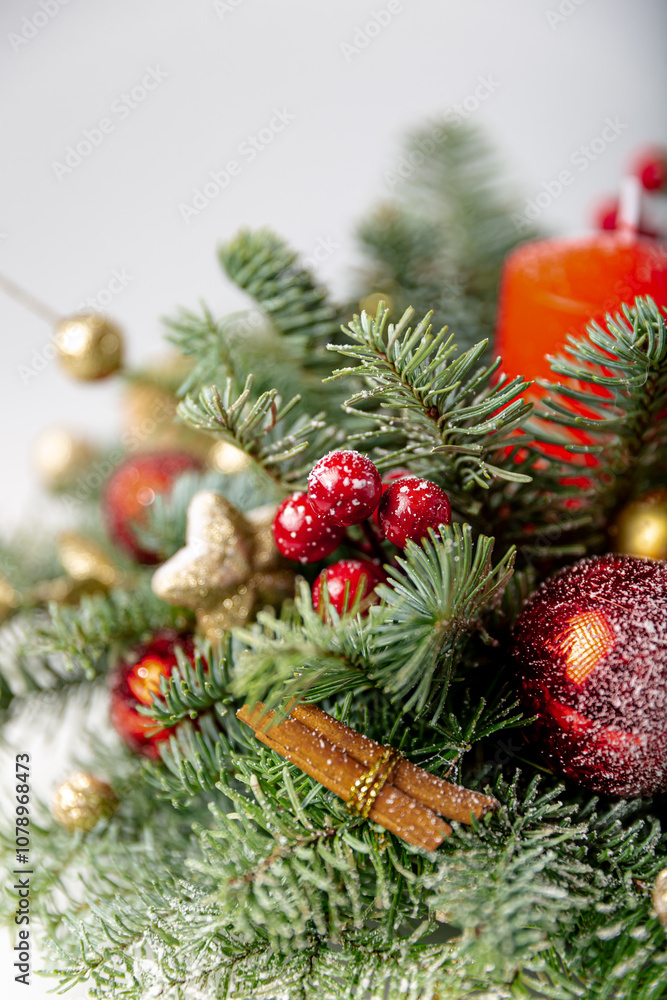 Decorated christmas tree with ornaments and lights, white background for festive holiday designs. Beautiful Christmas wreath decorated with pine cones, berries, red and golden balls Decorated christmas tree with ornaments and lights, white background for festive holiday designs. Beautiful Christmas wreath decorated with pine cones, berries, red and golden balls