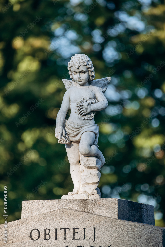 Zagreb, Croatia - August 15, 2024: A close-up of a burial at Mirogoj Cemetery in Zagreb, one of the most beautiful cemeteries in Europe Zagreb, Croatia - August 15, 2024: A close-up of a burial at Mirogoj Cemetery in Zagreb, one of the most beautiful cemeteries in Europe
