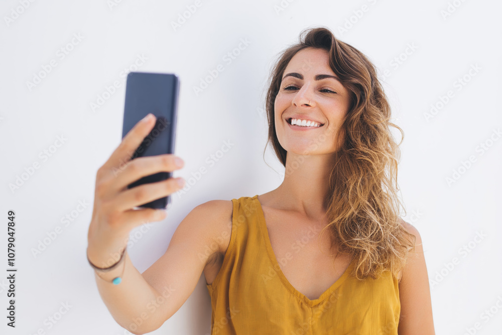Pretty woman taking frontal selfie Pretty woman taking frontal selfie