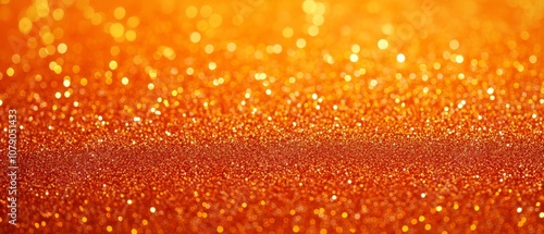A bright orange background with a lot of glitter
