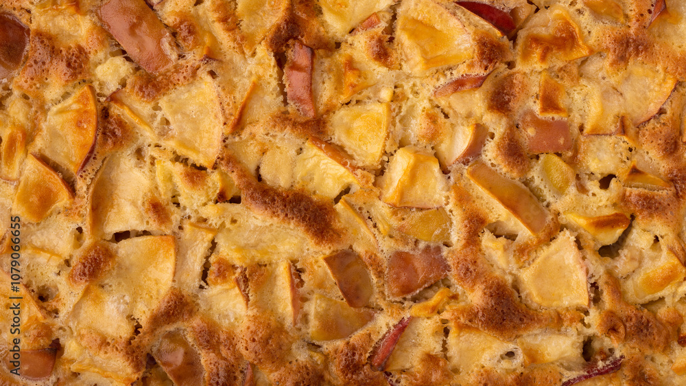freshly baked apple charlotte completely fills the frame. top view. background photo in 16x9 format freshly baked apple charlotte completely fills the frame. top view. background photo in 16x9 format