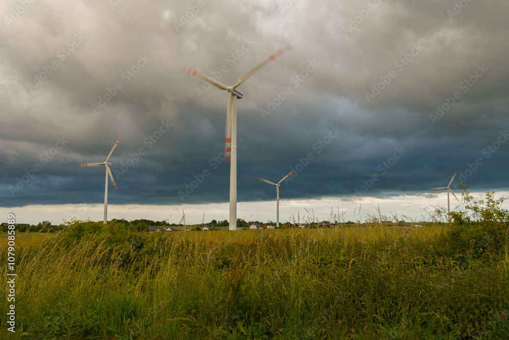 A view of windmills generating electricity from renewable energy sources A view of windmills generating electricity from renewable energy sources
