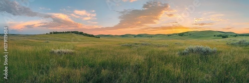 Golden Hour Splendor: Rolling Hills Under Vibrant Sky in Countryside Meadow