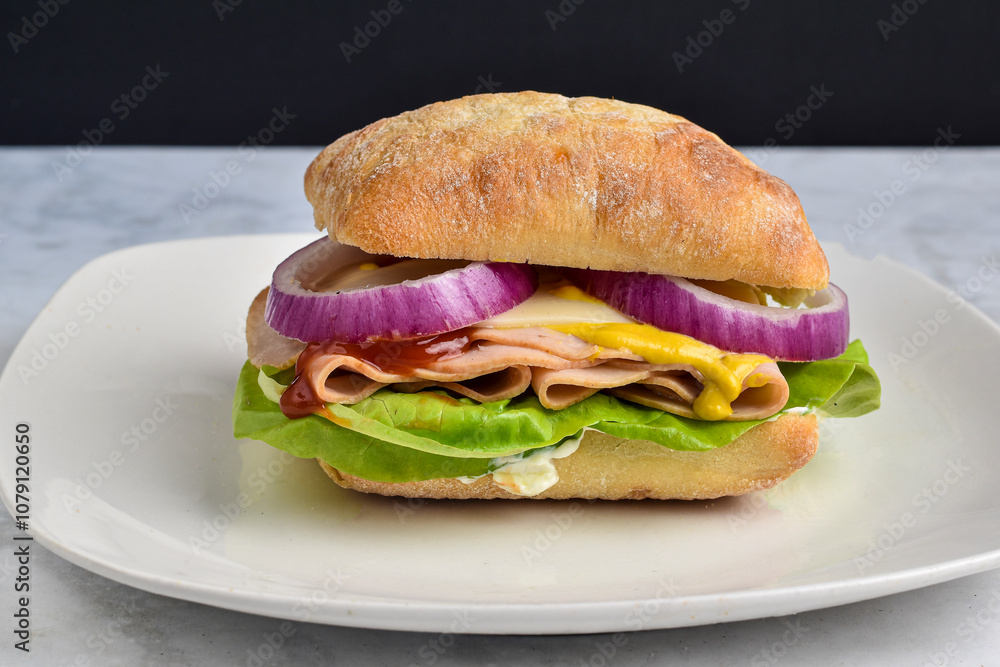 turkey sandwich with lettuce , onions and swiss cheese turkey sandwich with lettuce , onions and swiss cheese