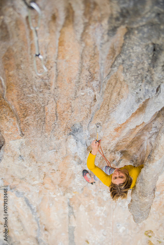 Wallpaper Mural A rock climber ascends to the summit via a difficult route. Torontodigital.ca