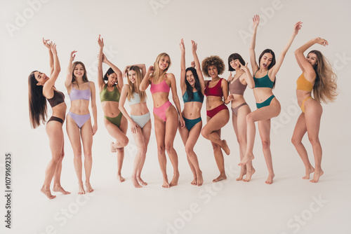 Photo of group girlish female ten women looking natural and without any filters isolated on white studio background