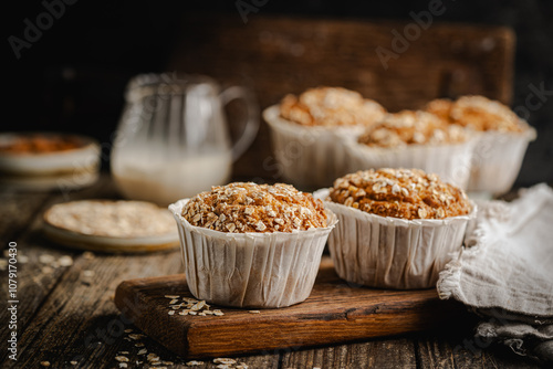 Home Baked Superfood Muffins With Oats, Seeds, Banana, Honey and nut milk. Healthy food and health life photo